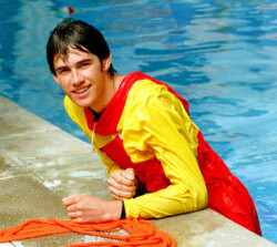 lifeguard in pool wearing an anorak